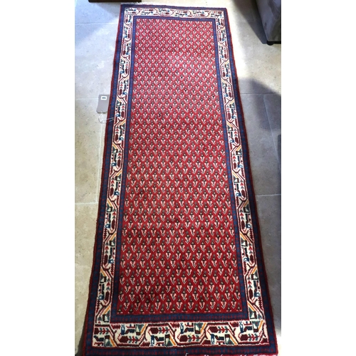 577 - A hand knotted woollen Araak runner - 2.0m x 0.75m