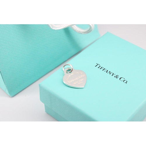 4 - A Tiffany & Co. sterling silver 'Please Return To Tiffany' charm - approx weight 5.94g, approx w... 