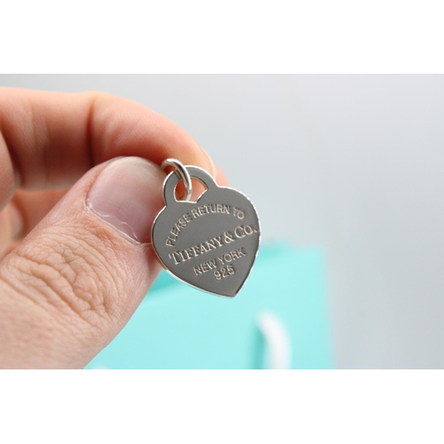 4 - A Tiffany & Co. sterling silver 'Please Return To Tiffany' charm - approx weight 5.94g, approx w... 