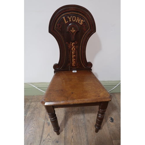 624 - A mahogany chair with Lyons Coffee Advert - in good condition, age related crack on seat, no evidenc... 