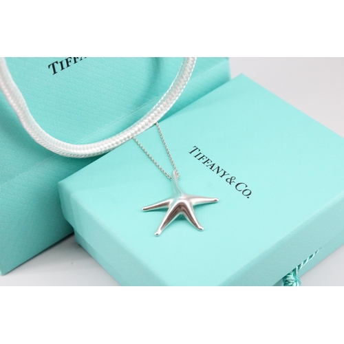 7 - A Tiffany & Co Elsa Peretti sterling silver starfish pendant and chain, with original box and ba... 