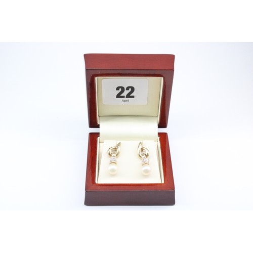 22 - A&nbsp;9ct Yellow Gold Pearl Drop Ear Rings with a Diamond Collar, Length approx.&nbsp;25mm, Pearls ... 