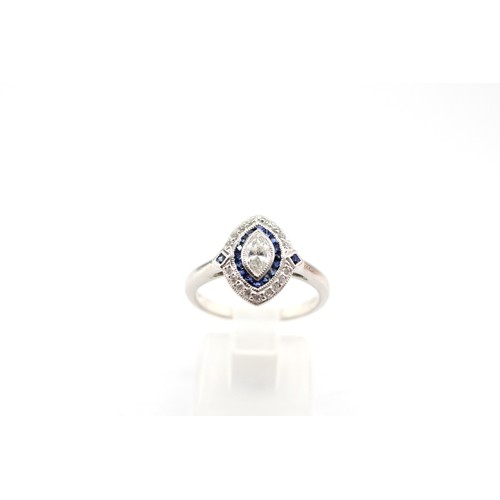 31 - A Fine Quality Platinum Marquis Shape Diamond and Sapphire Ring , The Diamonds and Sapphires are a R... 