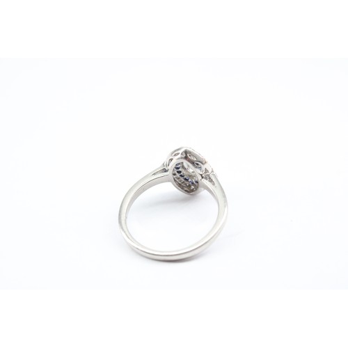 31 - A Fine Quality Platinum Marquis Shape Diamond and Sapphire Ring , The Diamonds and Sapphires are a R... 