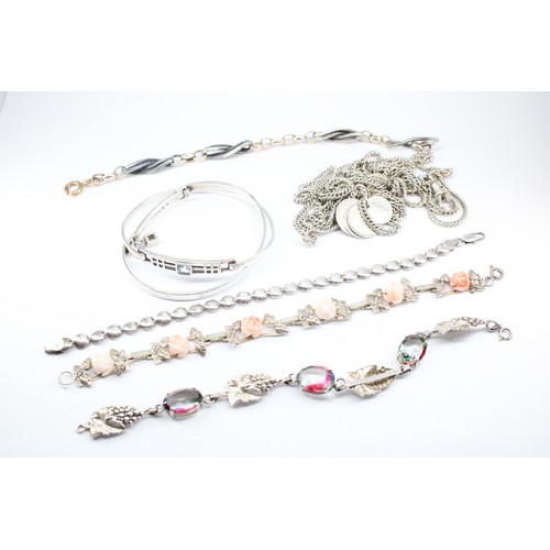 32 - Seven Pieces of White Metal Jewellery Including 2 Kit Heath Bangles and an Edwardian Muff Chain 142c... 