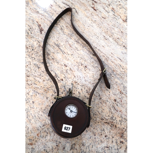 627 - A Night Watchman's clock in leather case with keys - working in the showroom