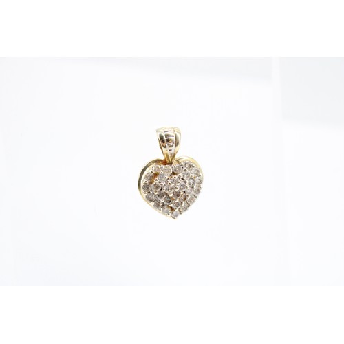 171 - A 9ct Heart Pendant Set with Small with Small White Stones Believed to be diamonds. 1.9cm x 1.3cm&nb... 