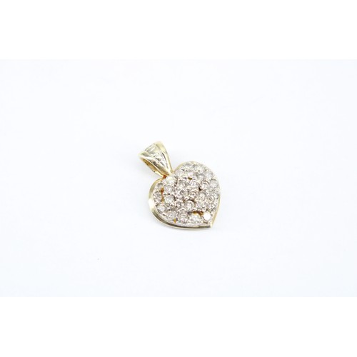 171 - A 9ct Heart Pendant Set with Small with Small White Stones Believed to be diamonds. 1.9cm x 1.3cm&nb... 