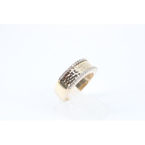 175 - A 9ct Band Featuring a central hammered panel set with small white stones&nbsp;Weight: 5.88g Size: P... 