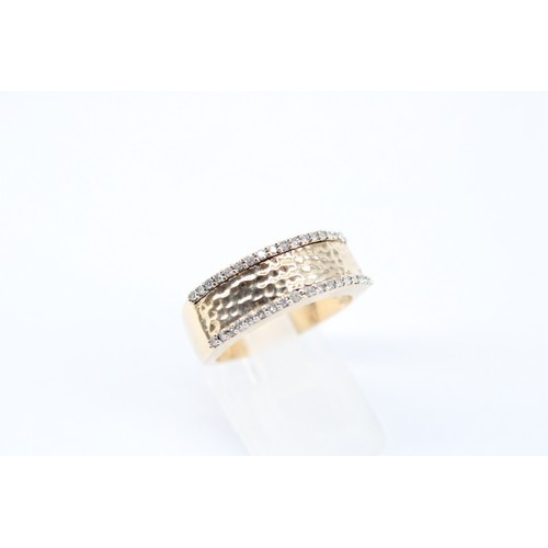 175 - A 9ct Band Featuring a central hammered panel set with small white stones&nbsp;Weight: 5.88g Size: P... 