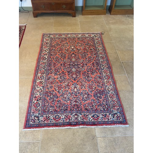 582 - A hand knotted woollen Sarough rug - 2.05m x 1.23m
