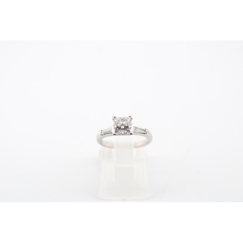 1 - A GIA Certified Princess Cut Diamond Ring, Featuring a Central 1.03 Carat, D, VS1 Stone Flanked by T... 