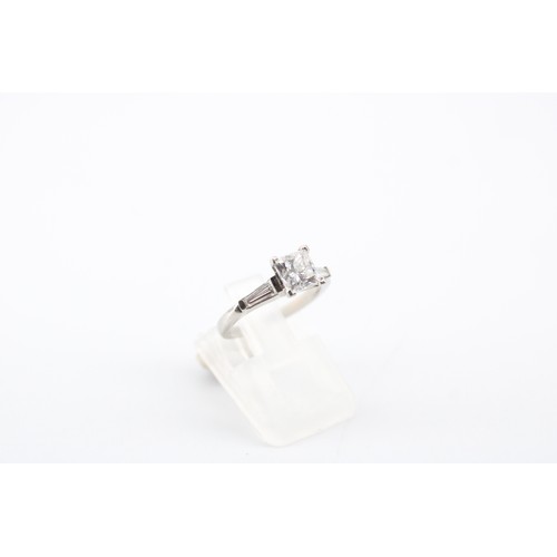 1 - A GIA Certified Princess Cut Diamond Ring, Featuring a Central 1.03 Carat, D, VS1 Stone Flanked by T... 