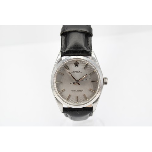 234A - A 1967 Stainless Steel Rolex Oyster Perpetual, Reference 1002, 34mm Featuring a Silver Sunburst Dial... 