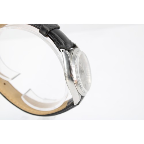 234A - A 1967 Stainless Steel Rolex Oyster Perpetual, Reference 1002, 34mm Featuring a Silver Sunburst Dial... 