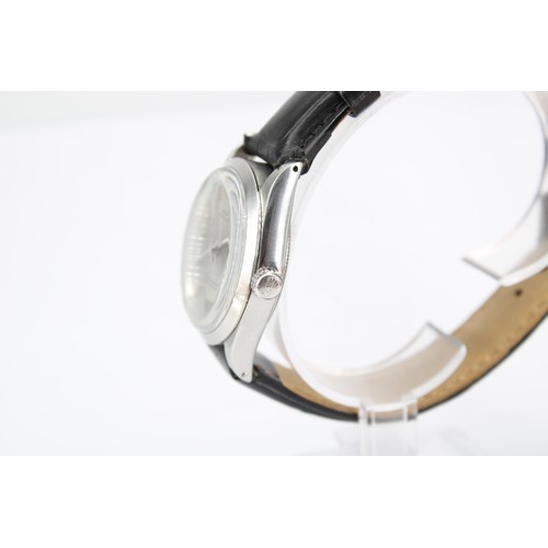 234A - A 1967 Stainless Steel Rolex Oyster Perpetual, Reference 1002, 34mm Featuring a Silver Sunburst Dial... 