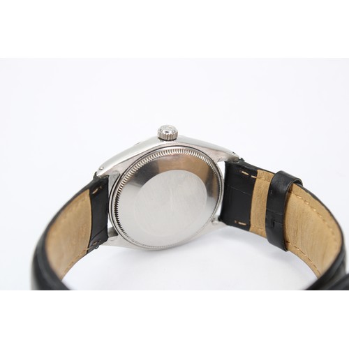 234A - A 1967 Stainless Steel Rolex Oyster Perpetual, Reference 1002, 34mm Featuring a Silver Sunburst Dial... 