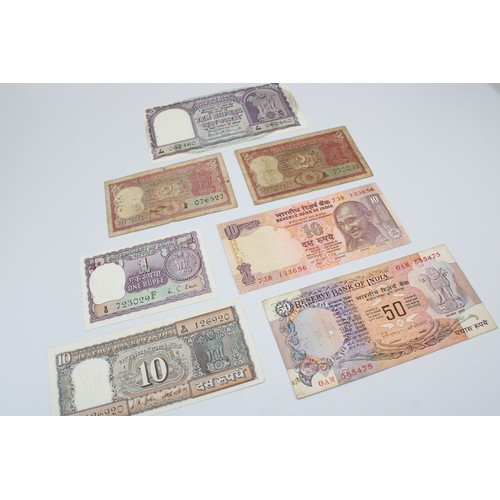 357 - A Group of assorted British Raj Notes & Post Colonial. George V/VI and others.&nbsp;George V. H.... 