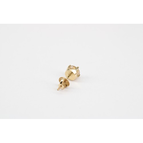 34 - A brilliant cut diamond single stud. Estimated 0.88ct K/L colour, SI1/2 clarity. Stamped 585. Weight... 