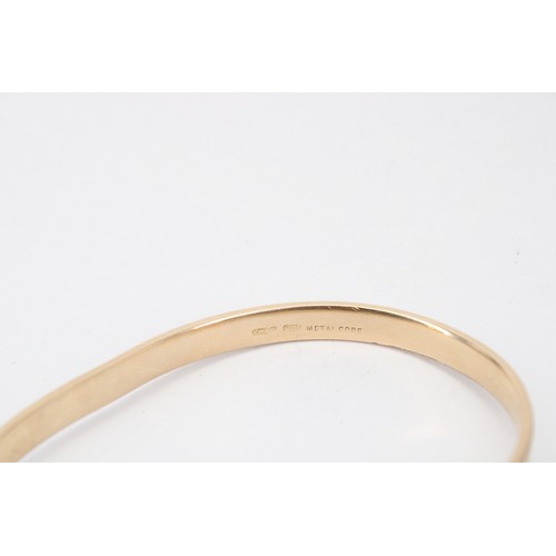 105 - A 9ct Metal Core Bangle&nbsp;Gross Weight: 22.62g&nbsp;