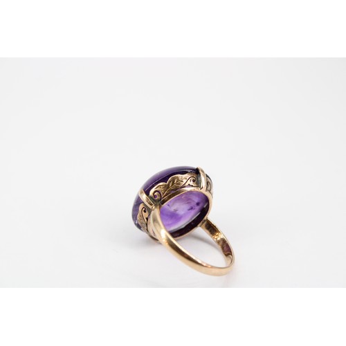 21 - A 14ct Cabochon Cut Amethyst Ring&nbsp;Weight: 6.42g Size: J