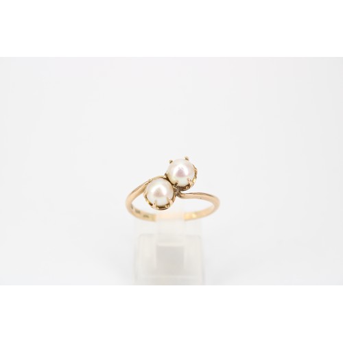 19 - A 14ct Pearl Bypass Ring&nbsp;Weight: 2.90g Size: N 1/2