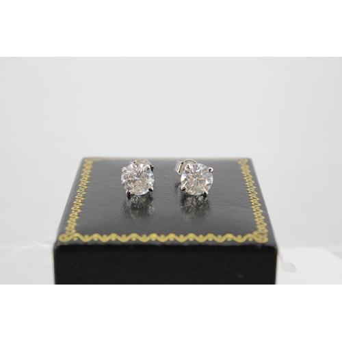 140 - A Pair of 18ct White Gold Diamond Ear Rings, the Diamonds are a Very Good Colour and Clarity, Colour... 