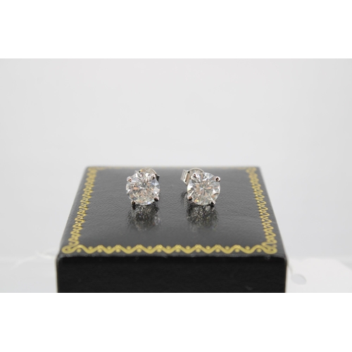 140 - A Pair of 18ct White Gold Diamond Ear Rings, the Diamonds are a Very Good Colour and Clarity, Colour... 