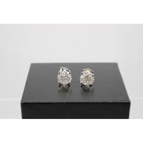 140 - A Pair of 18ct White Gold Diamond Ear Rings, the Diamonds are a Very Good Colour and Clarity, Colour... 