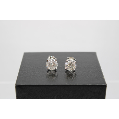 140 - A Pair of 18ct White Gold Diamond Ear Rings, the Diamonds are a Very Good Colour and Clarity, Colour... 