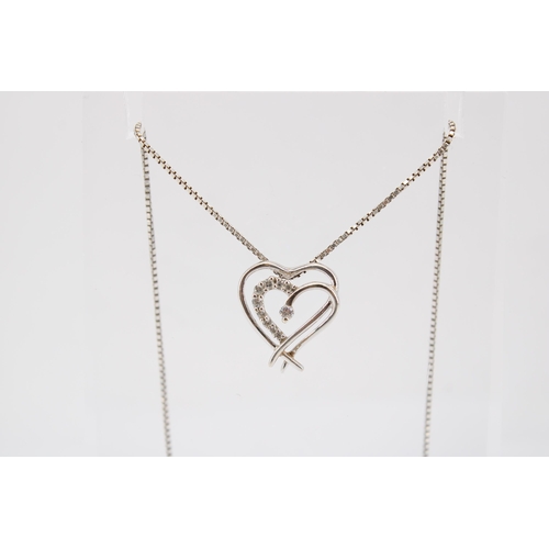 145 - A&nbsp;9ct White Gold Double Heart Pendant on a .925 Silver Chain, Heart approx. 16mm x 15mm, Chain ... 