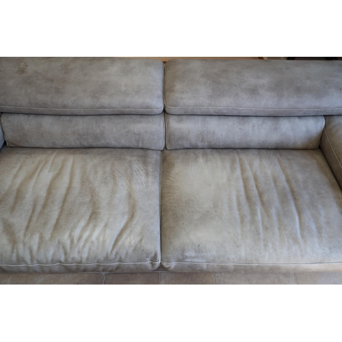 655 - A Rochebobios leather 2/3 seater sofa with adjustable rear headrests - No rips or tears but the leat... 