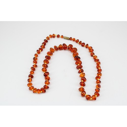 149 - A group of four assorted amber bead necklaces. Weight 161.28 grams&nbsp;