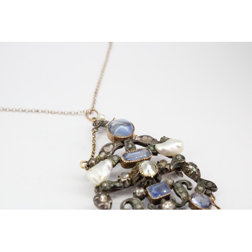 31 - An abstract openwork brooch pendant set with sapphire, diamond and freshwater cultured pearl. Length... 