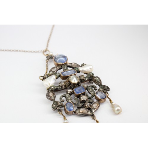 31 - An abstract openwork brooch pendant set with sapphire, diamond and freshwater cultured pearl. Length... 