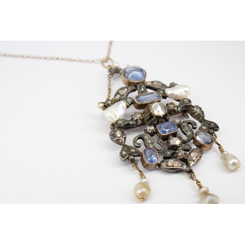 31 - An abstract openwork brooch pendant set with sapphire, diamond and freshwater cultured pearl. Length... 