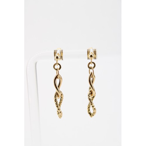 55 - A pair of ear pendants. Stamped 585. Length 35mm. Weight 1.97 grams