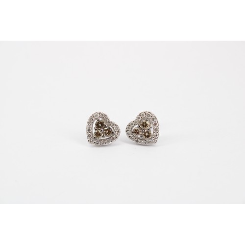56 - A pair of Le Vian diamond heart shape cluster ear studs. Stamped 14KT. Weight 3.91 grams