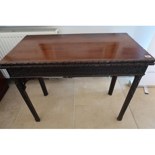  A Chinese Chippendale style mahogany fold over card table - needing some restoration