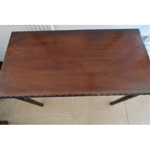  A Chinese Chippendale style mahogany fold over card table - needing some restoration