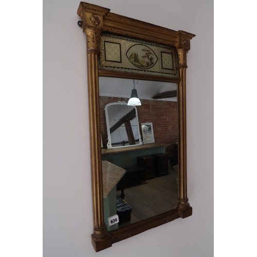  A 19th century gilt wall mirror with a painted top panel - 63cm x 36cm