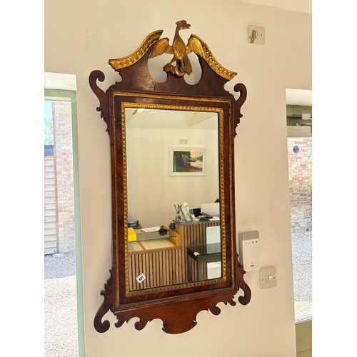  An early 19th century mahogany and gilt wall mirror surmounted by a HoHo bird - Height 118cm x Width... 