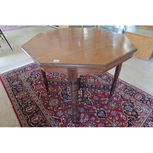  An Edwardian walnut octagonal centre table - Depth 89cm