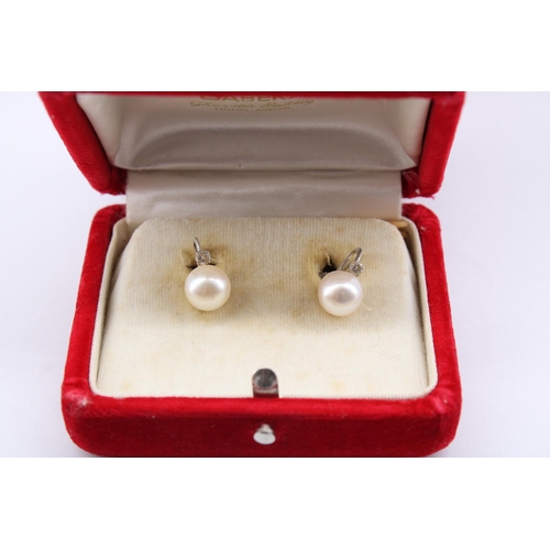 A Pair of 18ct White Gold Peal & Diamond Screw Back Earrings, Pearl Diameter 9.2mm&nbsp;Weight: ... 