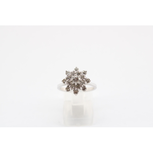 15 - An 18ct gold snowflake diamond cluster. Estimated total diamond weight 1ct. Size O. Weight 4.87 gram... 