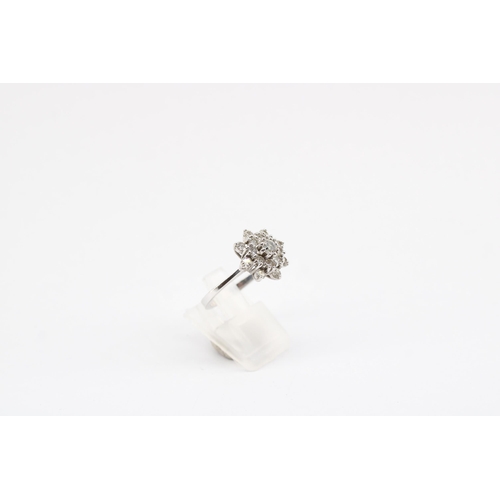 15 - An 18ct gold snowflake diamond cluster. Estimated total diamond weight 1ct. Size O. Weight 4.87 gram... 