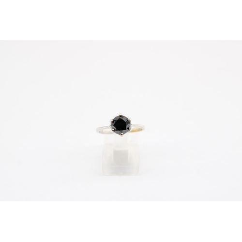 19 - A 9ct gold black diamond solitaire ring. Size P 1/2. Weight 2.34 grams