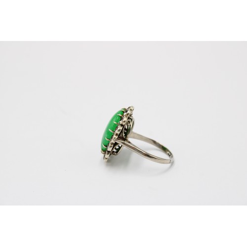 43 - An Early 20th Century 9ct Jade & White Stone Oval Cluster. 22mm x 17mm.&nbsp;Size: N Weight: 6g ... 