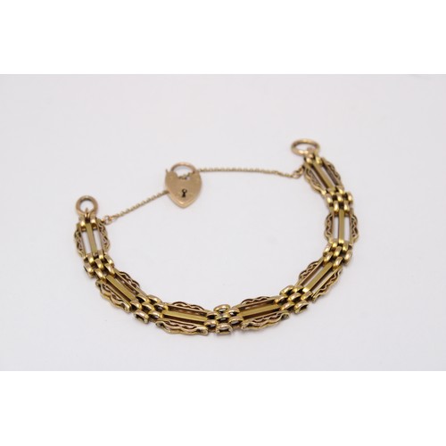 5 - A gate style bracelet. Surface Tests 9ct. Weight 13.80 grams