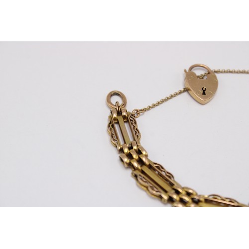 5 - A gate style bracelet. Surface Tests 9ct. Weight 13.80 grams